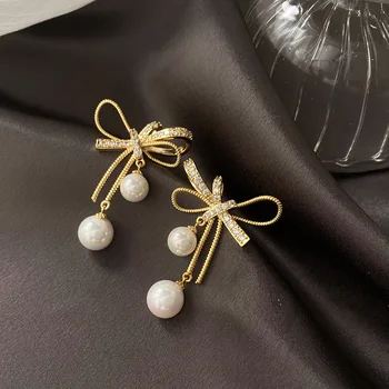 Vintage Očarljivo Bowknot Golden Drop Uhani Za Ženske Lep Metulj Kristalno Stud Pearl Romantično Piercing Nakit Uhan